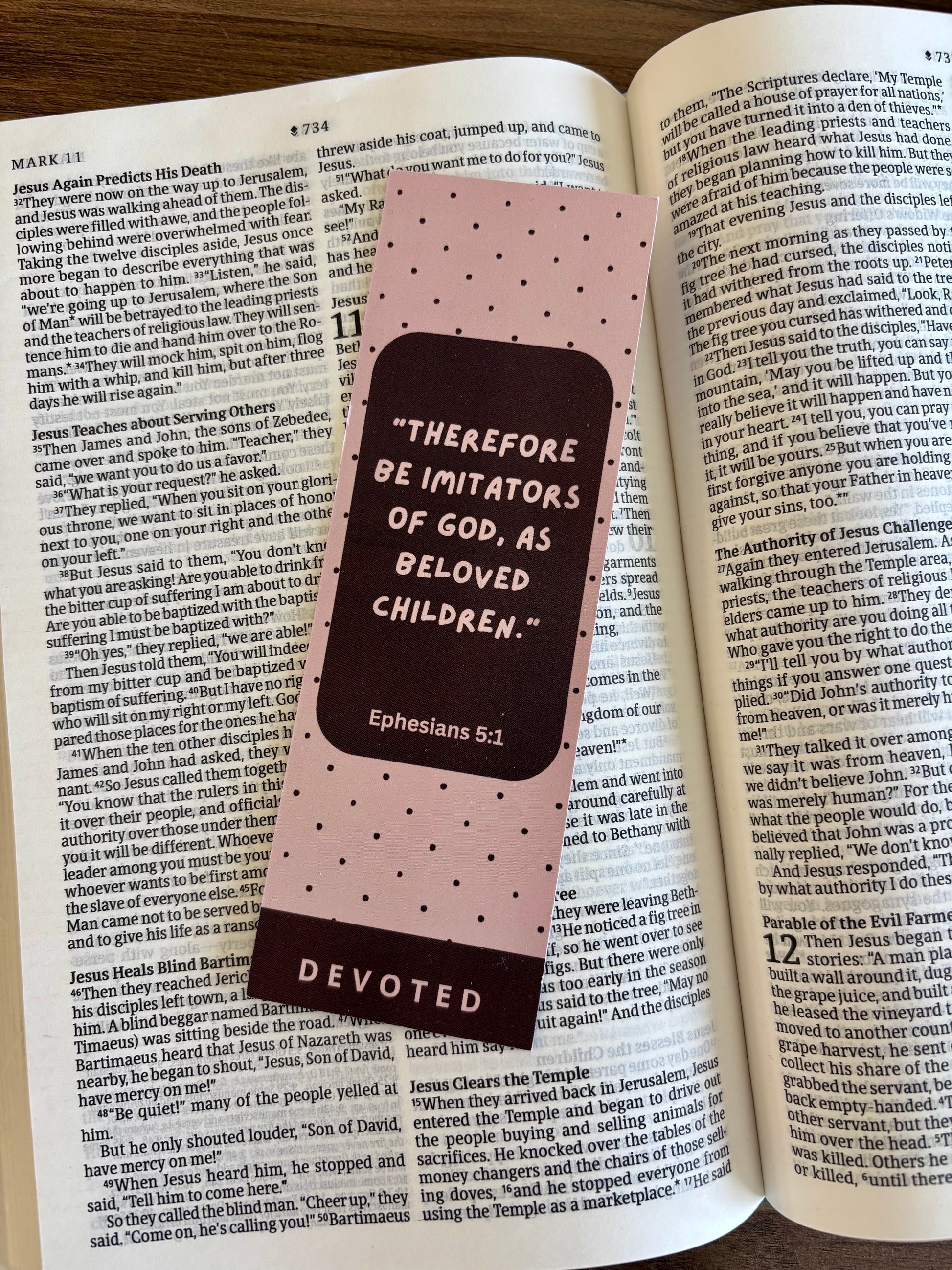 Pink bookmark with text on an open book