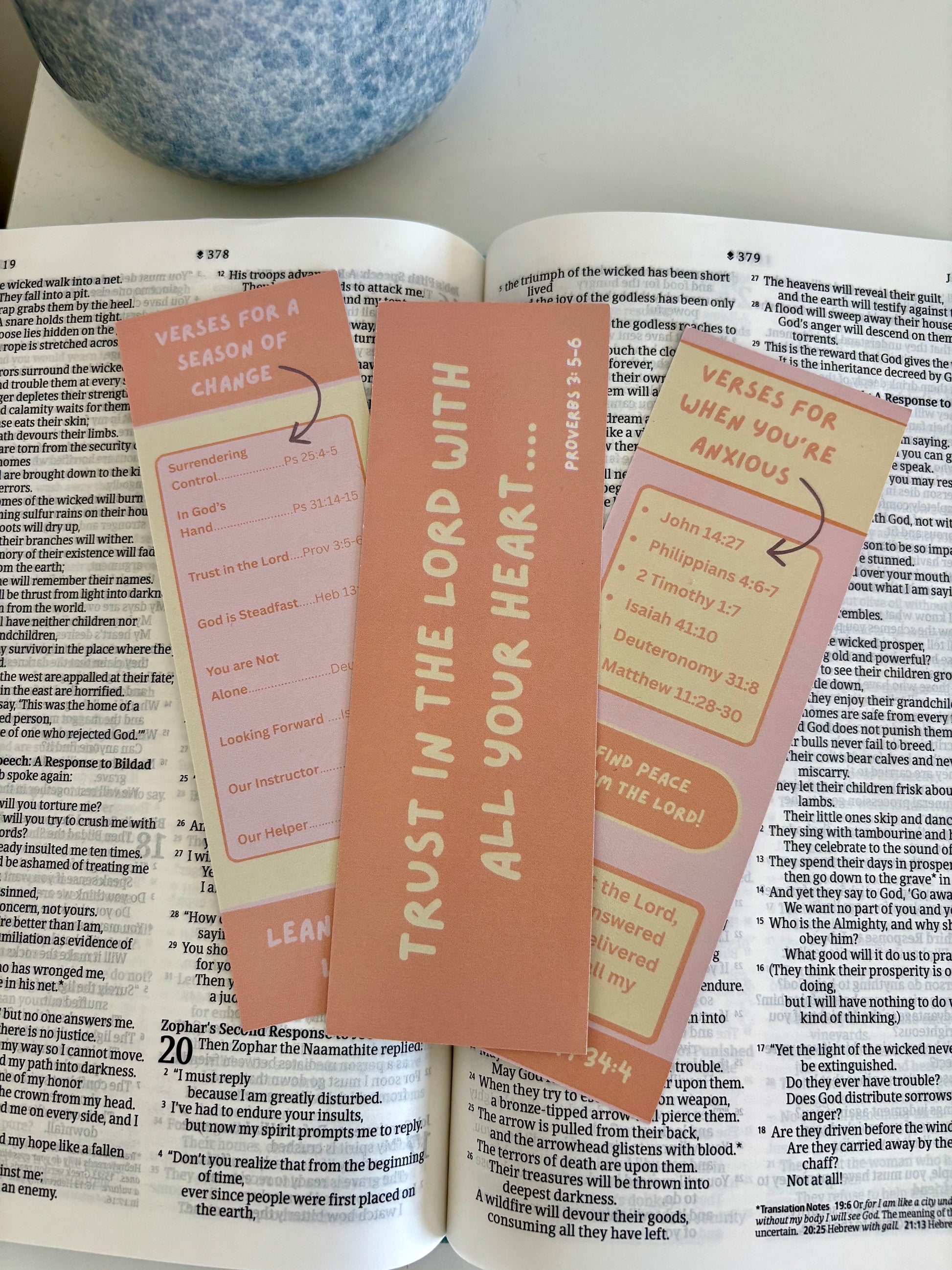 Bookmarks with motivational text on an open book