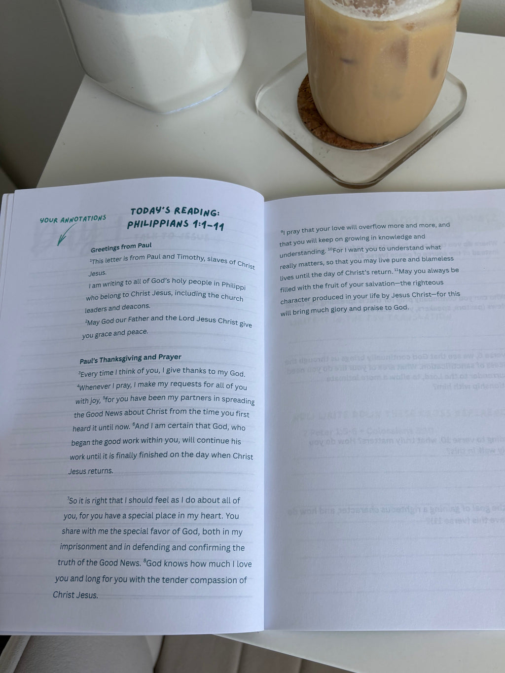 an open Bible study through Philippians on a desk
