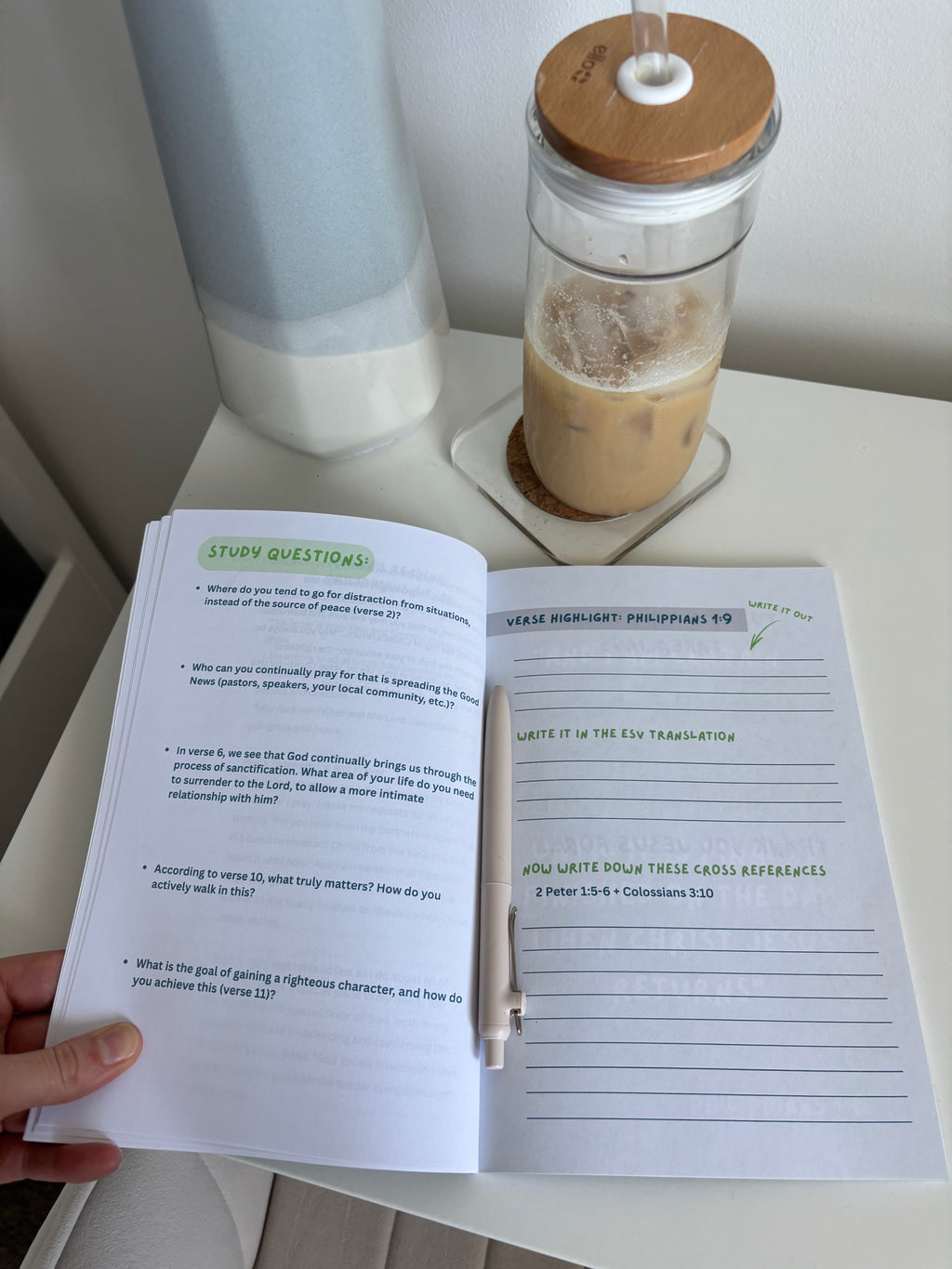 an open Bible study journal on a desk 